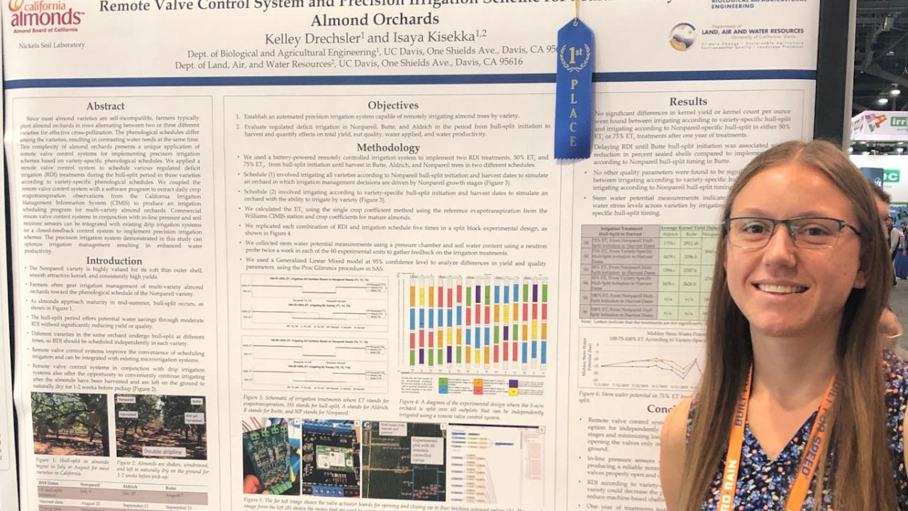 Kelley Drechsler with her award-winning poster. Kelley Drechsler with her award-winning poster.