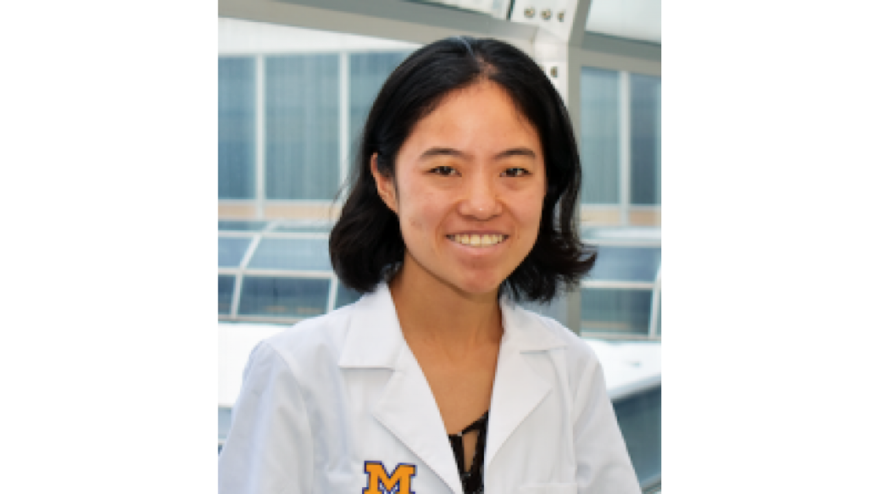 Portrait of Jiajie Jessica Xu in a lab coat