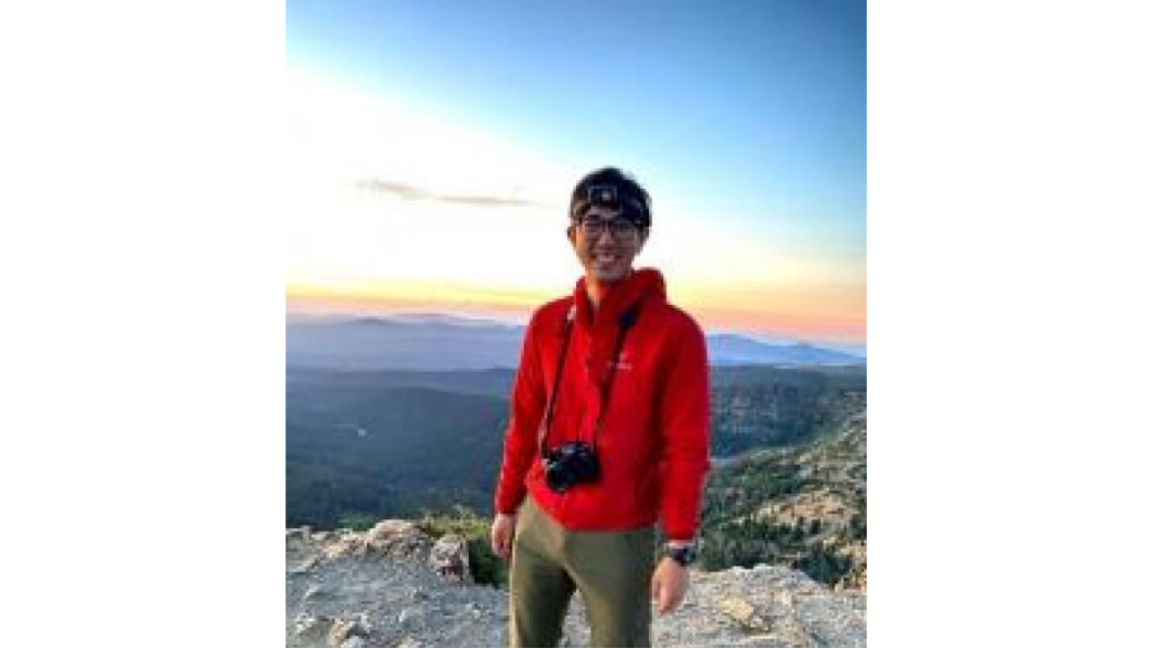 Picture of Kyle Cheung on a mountain