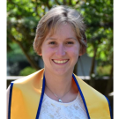 Portrait of Julie Meyers wearing a graduation stole