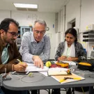 Stavros Vougioukas with two senior undergraduate students